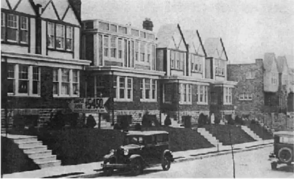 Elbridge Street Row Houses built by Hyman Korman and his sons, Max and Sam loading gravel, 1930s